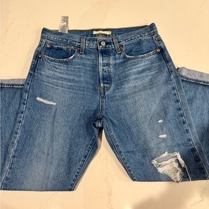 Distressed Blue Jeans